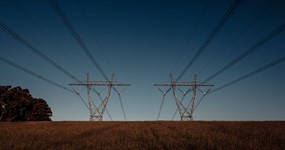 Network Tariff Reform: From Cost Recovery to Coordination in a High-CER System